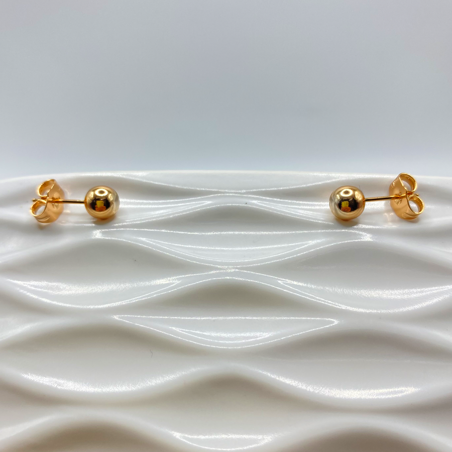 Broquel perla dorada