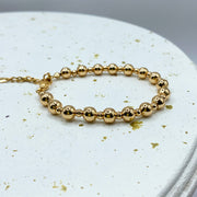 Pulsera Perlas Doradas