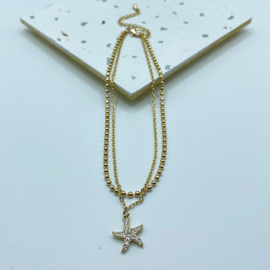 Tobillera Estrella de Mar con Llamador de Ángel