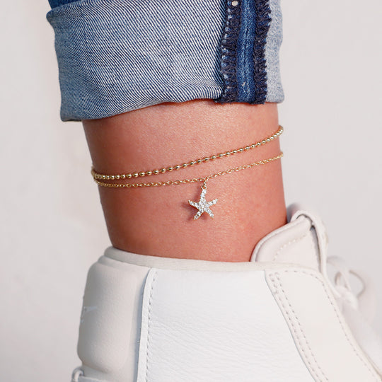 Tobillera Estrella de Mar con Llamador de Ángel