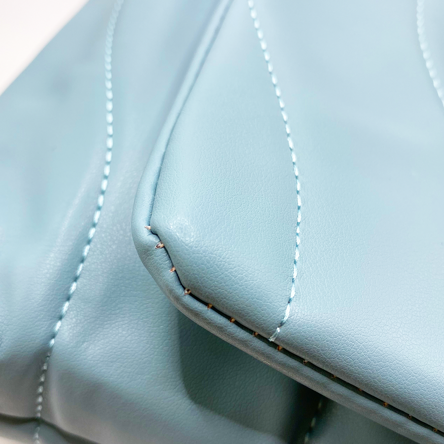 Quilted bag - Bolso acolchado con correa animal print