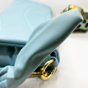 Quilted bag - Bolso acolchado con correa animal print