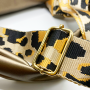 Quilted bag - Bolso acolchado con correa animal print