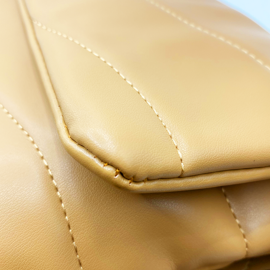 Quilted bag - Bolso acolchado con correa animal print