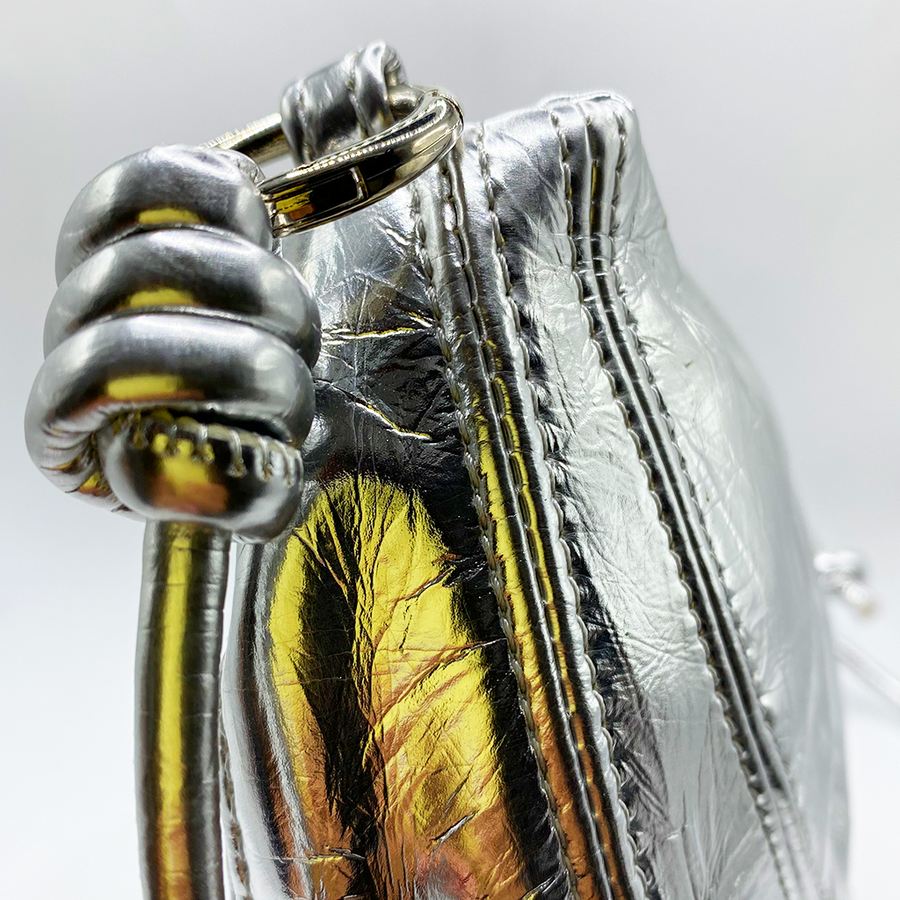 Shoulder bag - Bolso metálico con nudos